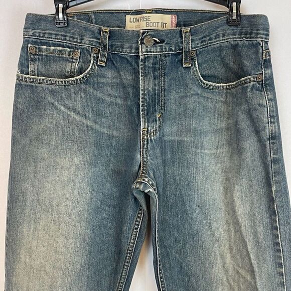 Levi’s Jeans Men’s Size W32 L34 Blue Denim Low Rise Bootcut Stretch Medium Wash - Picture 2 of 13